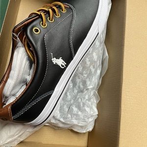 Polo sneakers can be worn by men or women. New..never warn.. purchased from LT